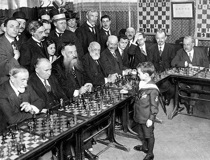 1920, Samuel Reshevsky, aged 8, playing against and defeating several chess masters simultaneously in France