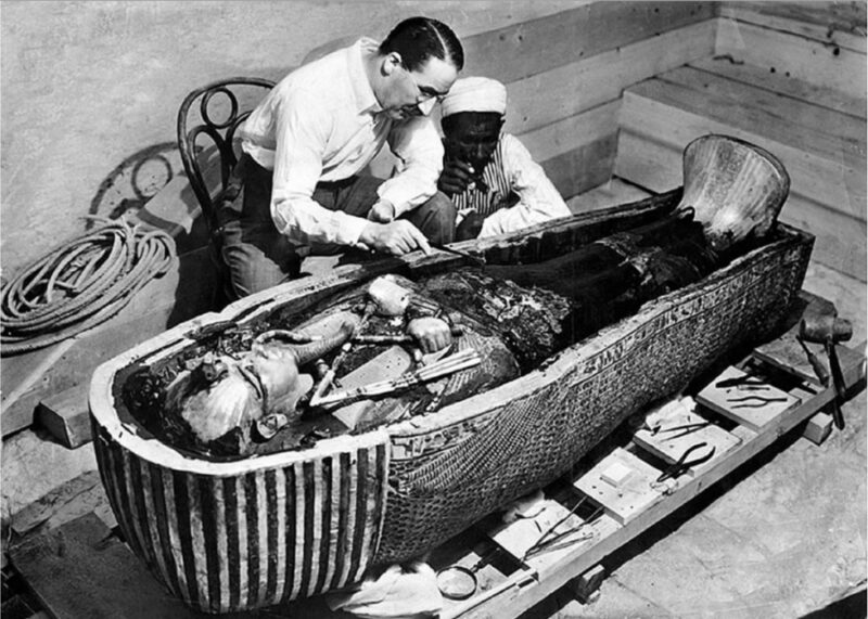 1922, Howard Carter examines King Tut's mummy