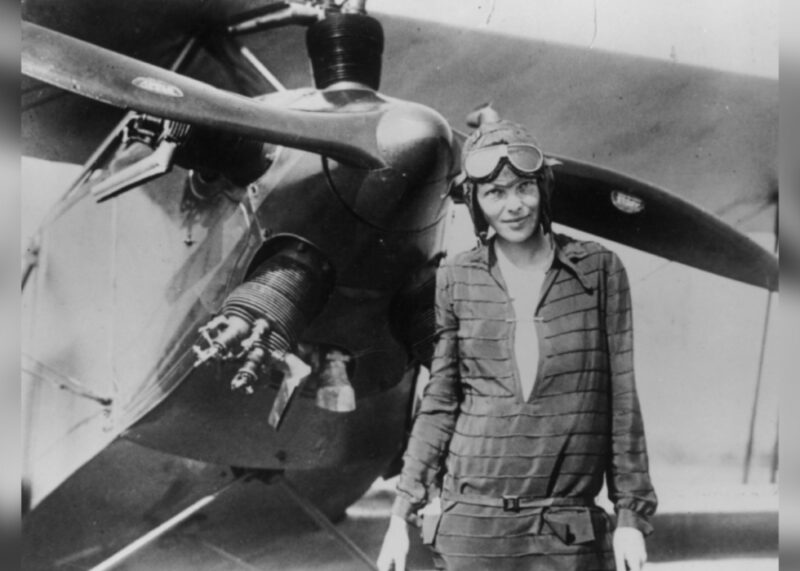 1928, Amelia Earhart with airplane