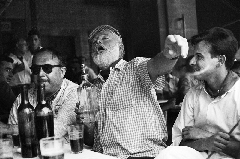 1950s, Ernest Hemingway having a hearty drink at a Havana bar