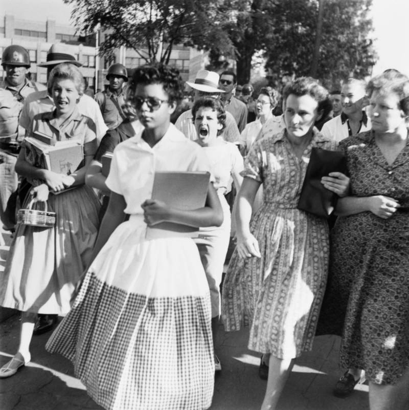 1957, Elizabeth Eckford ignores hate comments of fellow white students on her first day of high school