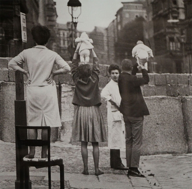 1961, Residents of West Berlin show children to their grandparents who reside on the eastern side